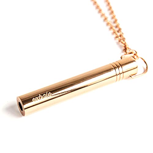 A golden necklace with a pendant of a whistle for mindfulness breathing