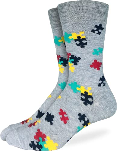 Socks with colorful jigsaw puzzle pieces on them 