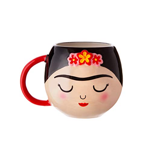A coffee mug with a print of Frida