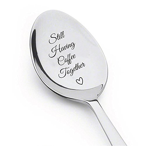Spoon engraved with "Still having coffee together"