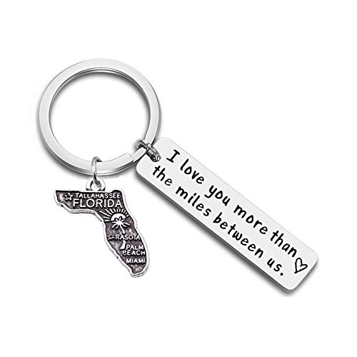 Keychain with a map of Florida and the text "I love you more than the distance between us"