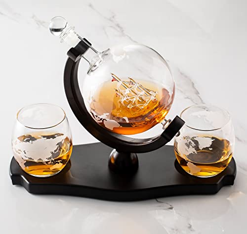 A decanter set with the world map etched