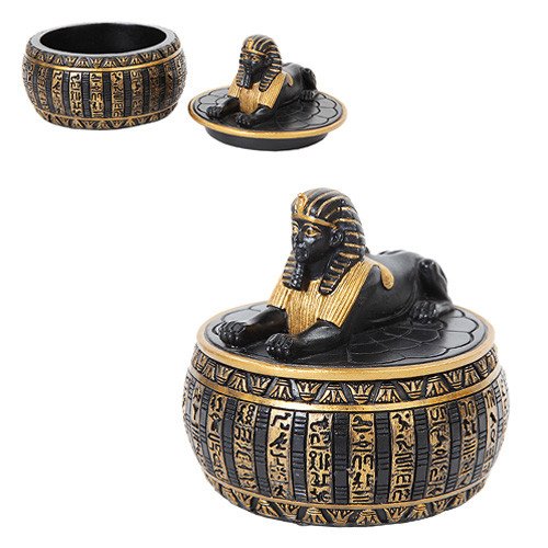 A bowl with a lid in the shape of and ancient Egyptian sphynx