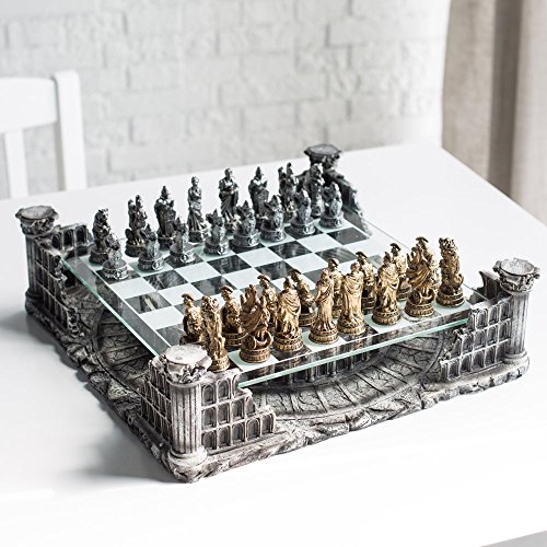 A glass chessboard over the Colosseum and bronze and silver-colored Roman figurines