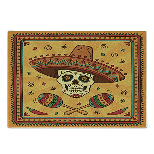 A glass cutting board with a print of skull with a sombrero in the Dia de los Muertos style