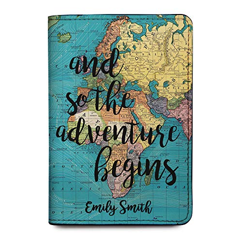 A passport holder with a map of the world and the text "and so the adventure begins"