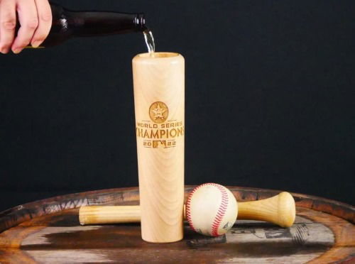 A wooden mug made from an old baseball bat