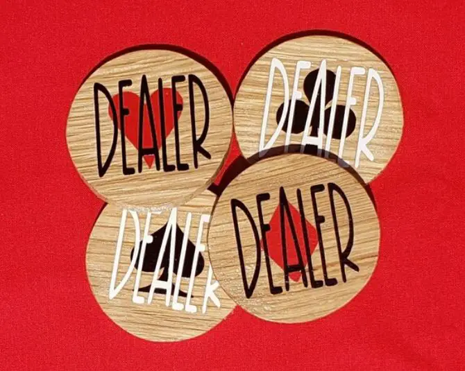 Wooden chips with "dealer"