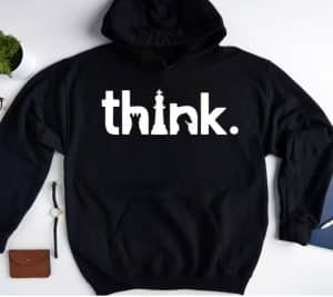 A black hoodie with "think"and chess pieces