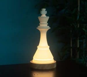 A chess piece desk lamp