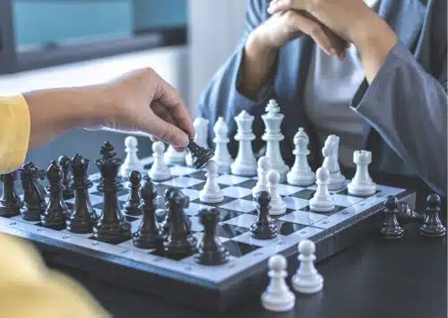 two people playing chess