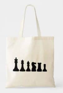 A tote bag with a print of chess pieces