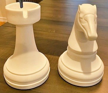 Two chess pices that serve as bookends