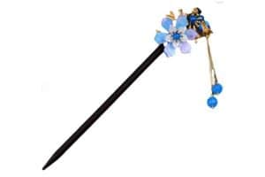 A hair pin with a blue flower