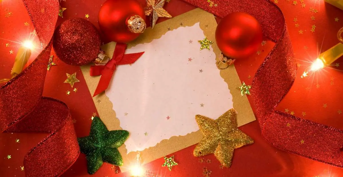A Christmas card with red Christmas balls and other decoration
