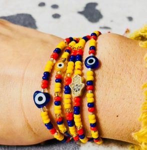 Bracelets with beads in the colors of the flag of Colombia