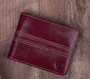 A wallet made from cricket ball material