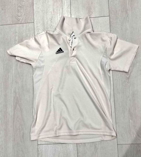 A white Adiddas cricket shirt