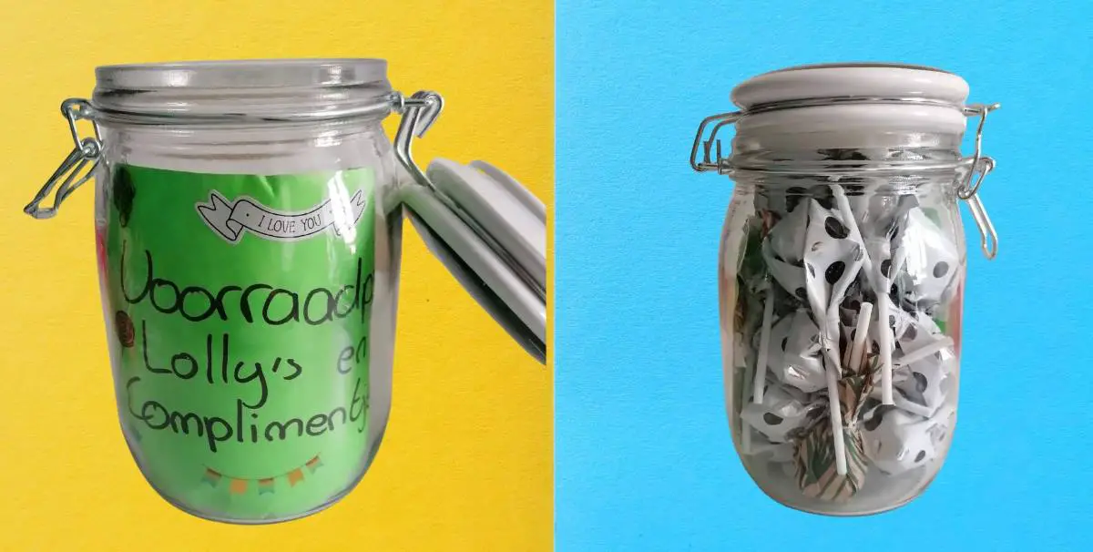 Two jars with lollipops and a label