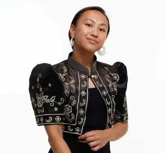 A woman wearing a traditional bolero from the Philippines