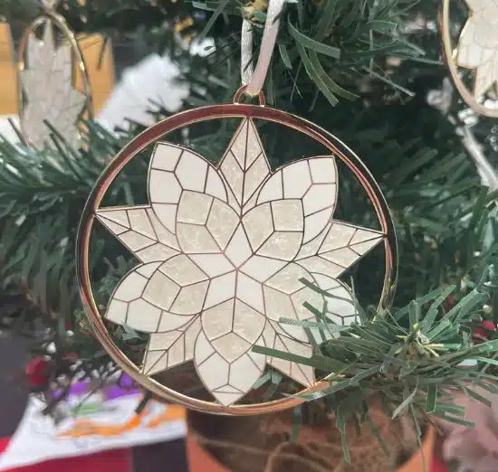 A star Christmas ornament made from lapiz art in the Philippines