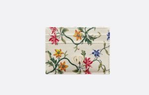 A credit card holder in floral print from the French fashion brand Dior