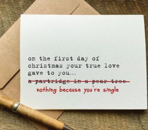 Card with "On the first day of Christmas your true love gave to you a partridge in a pear tree. Nothing. Because you’re single."