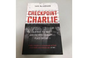 A book with the title "Checkpoint Charlie"