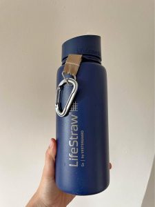 A stainless steel water bottle from the brand LifeStraw