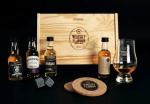 A box of different whiskey bottles