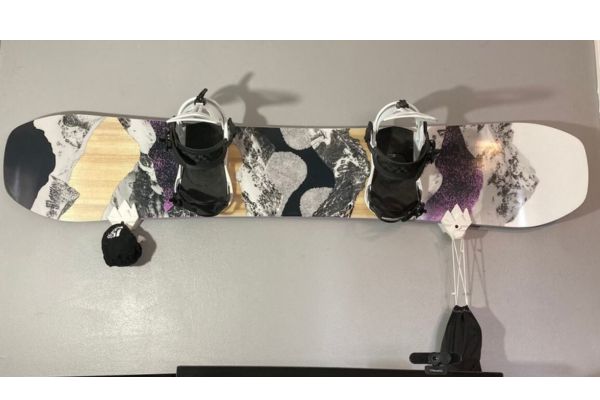 Wall mounts that hold a snowboard