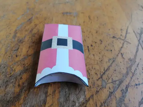 A paper bax with Santa's colors