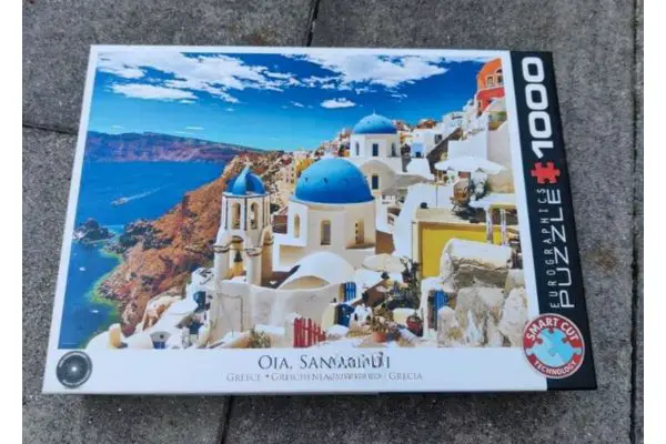 The box of a jigsaw puzzle of Santorini in Greece