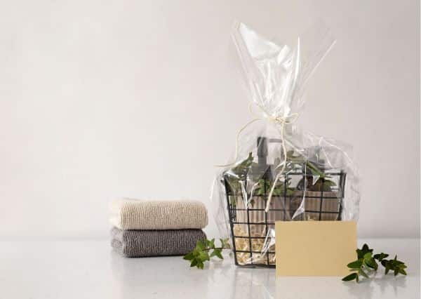 A basket with cellophane and a card