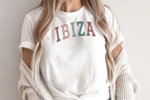 A woman wearing a white t-shirt with "Ibiza"