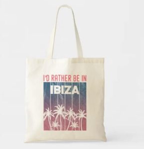 A tote bag with "I'd rather be in Ibiza"