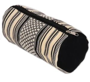 A handmade cosmetic bag from India with a black and white striped pattern