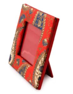 A photo frame with an Indian sari style