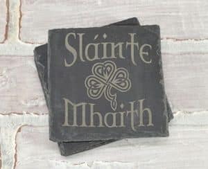 A set of coasters with an Irish Cheers blessing