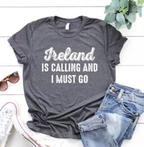 A grey t-shirt with the text "Ireland is calling and I must go"