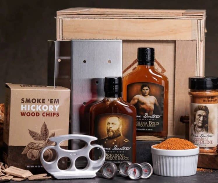 A crate filled with bbq and grill items 