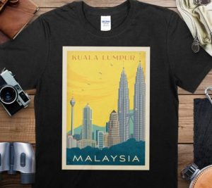 A black t-shirt with a print of the skyline of Kuala Lumpur, Malaysia