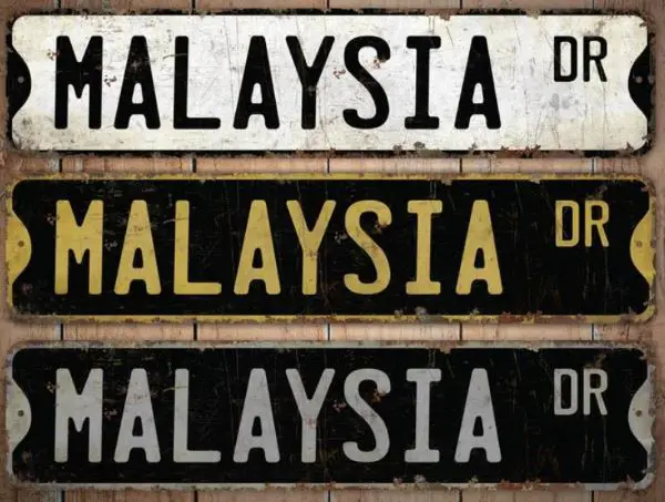 Three vintage looking street signs with 'Malaysia'