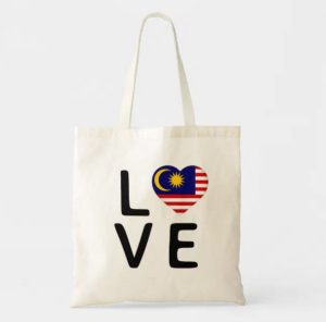 A tote bage with 'love' and a heart in the color of the flag of Malaysia