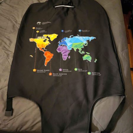A black suitcase cover with a world map