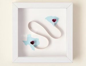 A 3d print of two state maps connected by a heart