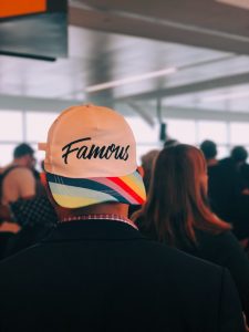Cap with "famous" text