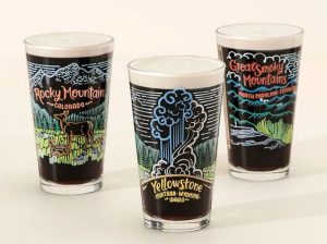 Three beer glasses with different designs inspired by US national parks