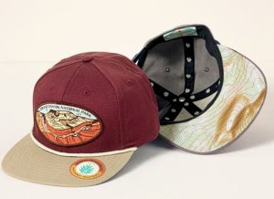Two hats with a national park-themed design