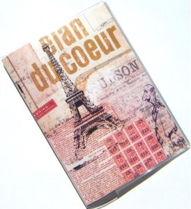 A passport cover with a decoration in Paris-theme